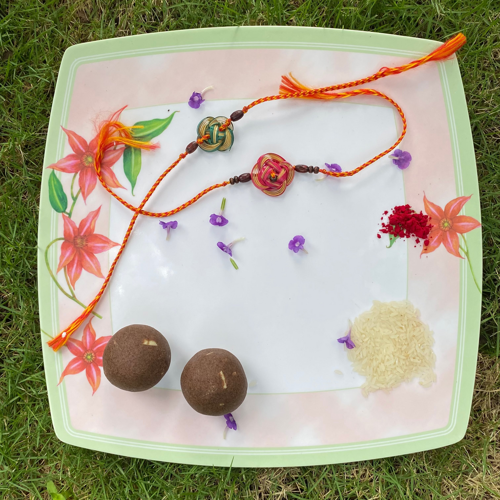 Orange Bamboo Flower Rakhi