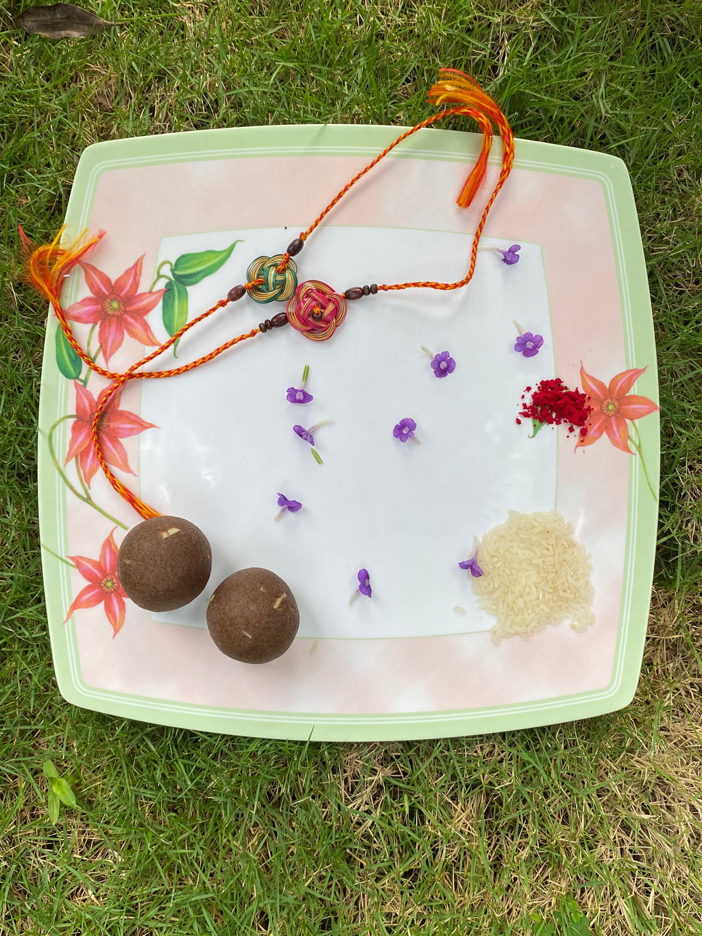 Orange Bamboo Flower Rakhi