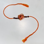 Orange Bamboo Flower Rakhi