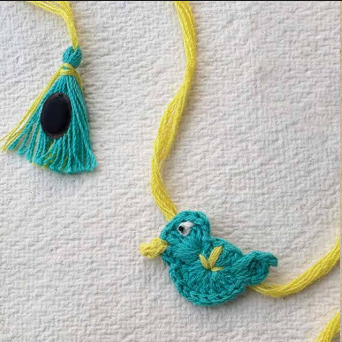 Seed Rakhi pack (with chawal and kumkum) - Bird with Sponge Gourd, Amaranthus, purslane