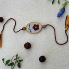 Seed Rakhi pack (with chawal and kumkum) - Love Is In The Air ( Fabric Canvas)
