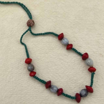 Seed Rakhi pack (with chawal and kumkum)- Red Bead & Vaijayani