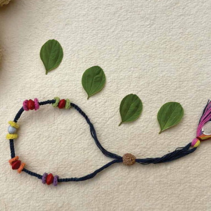 Seed Rakhi pack (with chawal and Kumkum) - Colorful Flower with sponge gaurd, Amaranthus, Purslane seeds
