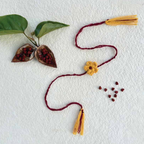 Seed Rakhi pack (with chawal and Kumkum) - Love is in the air (Small Flower with Bixa, Amaranthus, Purslane seeds)