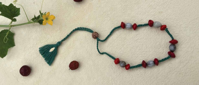 Seed Rakhi pack (with chawal and kumkum)- Red Bead & Vaijayani
