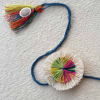 Seed Rakhi pack (with chawal and Kumkum) - Love Is In The Air (Colourful Flower)